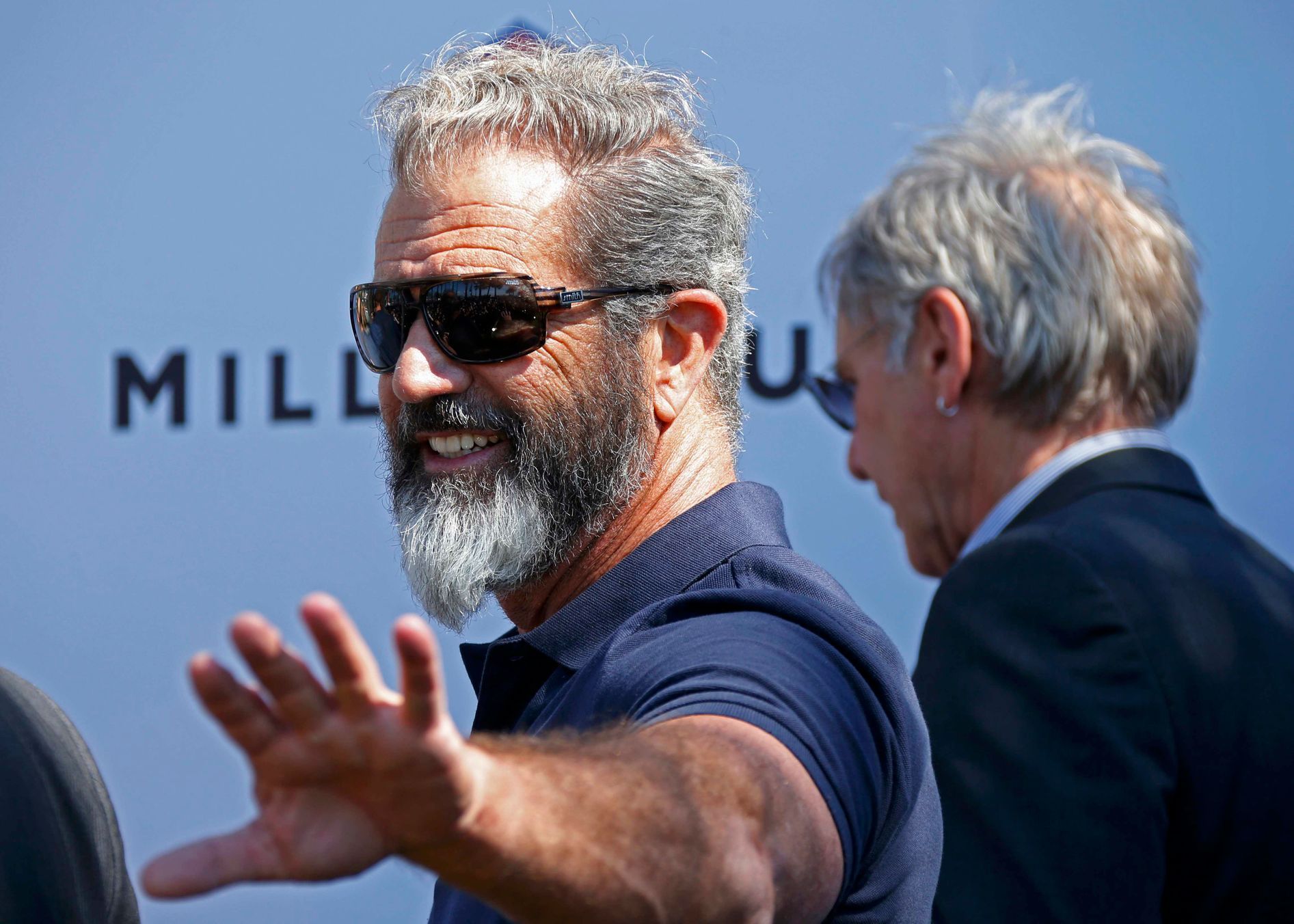 Cast members Mel Gibson and Harrison Ford pose  during a photocall on the Croisette to promote the film &quot;The Expendables 3&quot; during the 67th Cannes Film Festival in Cannes