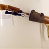 An arm prosthesis with a gun is on display at the new spy museum in Oberhausen, Germany, Monday, April 340, 2012. The exhibition "Top Secret" explains the work of secret services and shows unique original details from the Russian KGB, the CIA or the east German STASI during the cold war. (AP Photo/Martin Meissner)