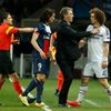 Paris St Germain coach Blanc reacts as Cavani struggles with Chelsea's Luiz during their Champions League quarter-final first leg soccer match at the Parc des Princes Stadium in Paris