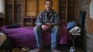 51-year-old Joseph Ciavardone poses for a photograph as he sits on a FEMA supplied cot in the shell of what was his home on Staten Island November 14, 2012. Ciavodone's is just one of hundreds of homes destroyed in New Dorp and the surrounding areas on the south shore of Staten Island by Hurricane Sandy. Ciavardone says he will rebuild his family home and remain in the neighbourhood of his childhood. Picture taken November 14, 2012. REUTERS/Mike Segar (UNITED STATES - Tags: DISASTER ENVIRONMENT) ATTENTION EDITORS PICTURE 15 OF 19 FOR PACKAGE 'SURVIVING SANDY' SEARCH 'SEGAR SANDY' FOR ALL PICTURES Published: Lis. 20, 2012, 3:31 odp.