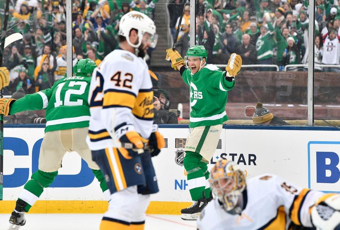 Jan 1, 2020; Dallas, TX, USA; Dallas Stars defenseman Andrej Sekera (5) celebrates with teammates after scoring a goal against the Nashville Predators during the third pe