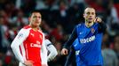 Football: Monaco's Dimitar Berbatov celebrates scoring their second goal as Arsenal's Alexis Sanchez looks on dejected