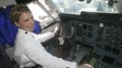 Ukrainian former Prime Minister Yulia Tymoshenko sits inside a cockpit of a plane as she visits the Le Bourget air salon near Paris in this June 2005 handout photo. Poland said on Thursday Ukraine's reputation would "suffer dramatically" if no humanitarian solution for the case of jailed ex-premier Yulia Tymoshenko were found, but criticised calls for a boycott of the pending European soccer tournament in Ukraine. REUTERS/Alexander Prokopenko/Yulia Tymoshenko Press Service/Handout (UKRAINE - Tags: POLITICS CRIME LAW TRANSPORT) FOR EDITORIAL USE ONLY. NOT FOR SALE FOR MARKETING OR ADVERTISING CAMPAIGNS. THIS IMAGE HAS BEEN SUPPLIED BY A THIRD PARTY. IT IS DISTRIBUTED, EXACTLY AS RECEIVED BY REUTERS, AS A SERVICE TO CLIENTS