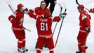 Andrei Stepanov of Belarus (C) celebrates with team mates his goal against the U.S. during the second period of their men's ice hockey World Championship Group B game at