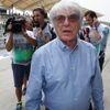Formula One commercial supremo Ecclestone walks in the pit lane during the second practice session of the Malaysian F1 Grand Prix at Sepang International Circuit outside Kuala Lumpur