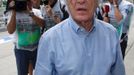 Formula One commercial supremo Bernie Ecclestone walks in the pit lane during the second practice session of the Malaysian F1 Grand Prix at Sepang International Circuit o