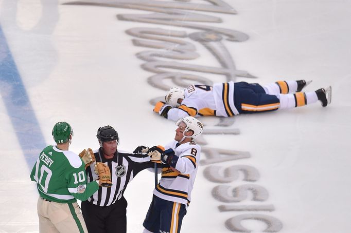 Jan 1, 2020; Dallas, TX, USA; Nashville Predators defenseman Ryan Ellis (4) lays on the ice after being injured by Dallas Stars right wing Corey Perry (10) as Predators c