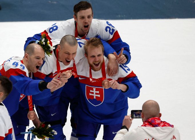 2022 Beijing Olympics - Ice Hockey - Men's Bronze Medal Game - Sweden v Slovakia - National Indoor Stadium, Beijing, China - February 19, 2022.  Slovakia players celebrat