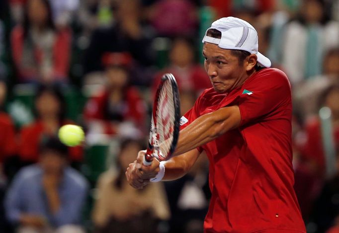 Japan's Ito returns a shot to Czech Republic's Stepanek during their Davis Cup quarter-final tennis match in Tokyo