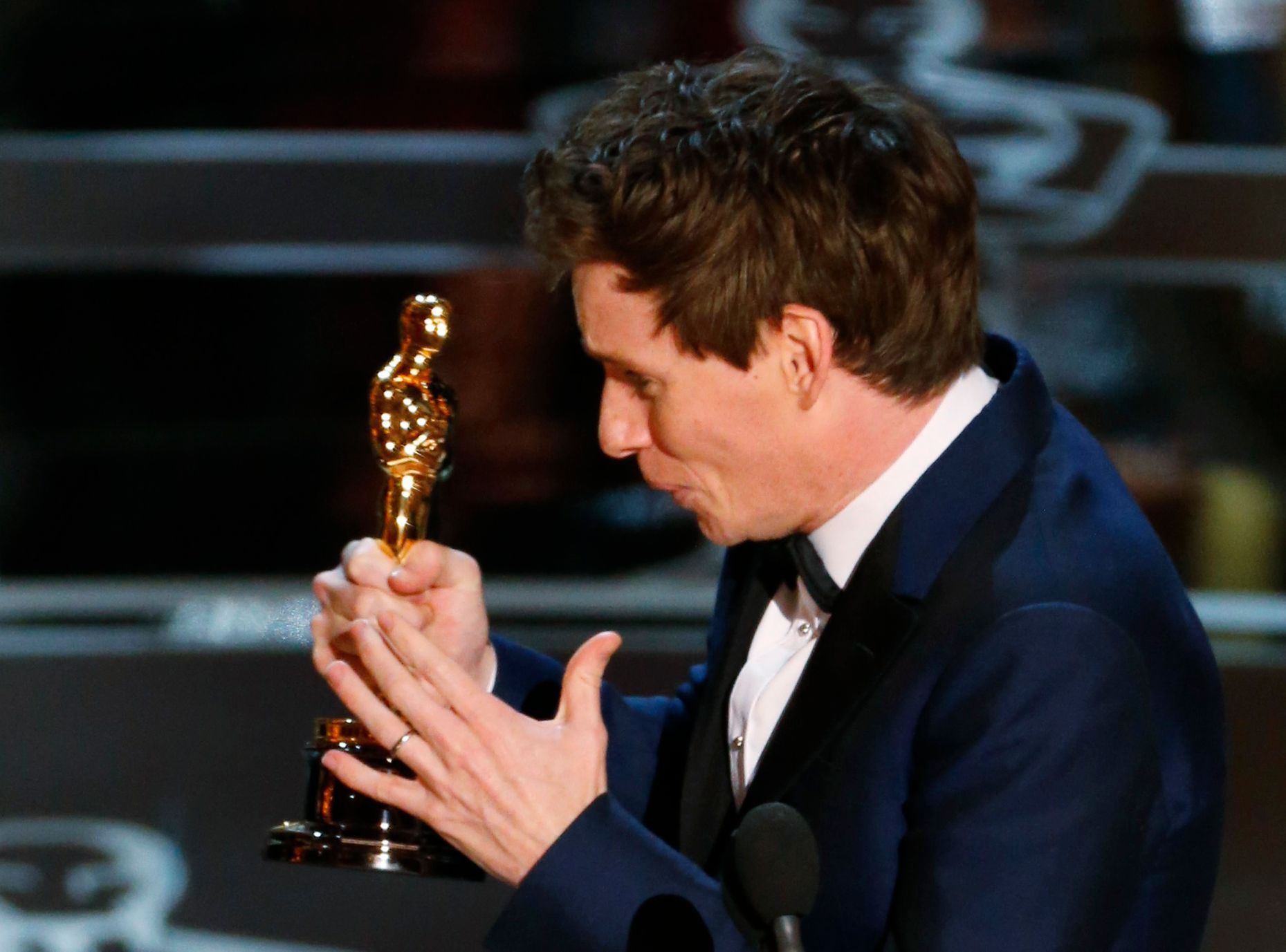 Actor Redmayne reacts after winning the Oscar for best actor for his role in &quot;The Theory of Everything&quot; during the 87th Academy Awards in Hollywood