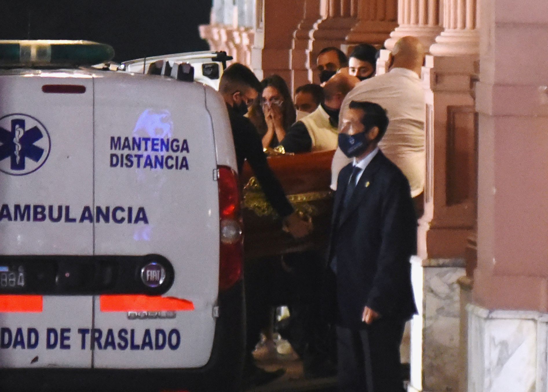 The coffin holding the body of soccer legend Diego Maradona arrives at the Casa Rosada presidential palace, in Buenos Aires