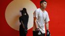 Unemployed Belgian Mohamed Sammar reacts during a "Fit for a job" boxing class in Brussels July 1, 2013. Sammar, 27, has been looking for a job in the construction sector for 2 years. "Fit for a job" is the initiative of former Belgian boxing champion Bea Diallo, whose goal was to restore the confidence of unemployed people and help them find a job through their participation in sports. Picture taken July 1, 2013. REUTERS/Francois Lenoir (BELGIUM - Tags: SPORT BOXING SOCIETY BUSINESS EMPLOYMENT) Published: Čec. 5, 2013, 4:31 odp.