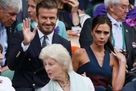 Victoria Beckham a David Beckham na Wimbledonu 2014