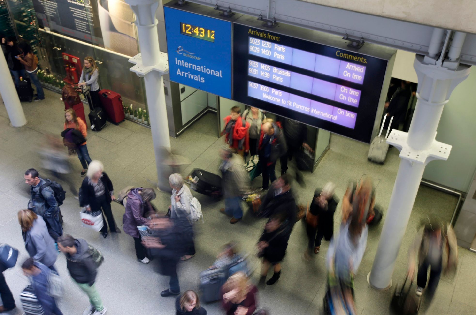 Passengers arrive from a Eurostar train at St Pancras Station in London