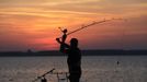 Filipe Cardana of Spain casts during the 14th Carpfishing World Championship in Corbu village, 310 km (192 miles) east of Bucharest, September 28, 2012. REUTERS/Radu Sigheti (ROMANIA - Tags: SPORT SOCIETY) Published: Zář. 28, 2012, 9:07 odp.