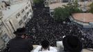 Ultra-Orthodox Jewish men attend a protest, against a new conscription law that might force ultra-Orthodox Jews to serve in the army, in Jerusalem's Mea Shearim neighbourhood, June 25, 2012. Israel's Supreme Court ruled in February that the so-called "Tal Law", a 2002 measure that effectively shielded ultra-Orthodox communities from military service, was unconstitutional. The government, faced with the court's ruling, must now either revamp the law, which will expire in August, or approve new legislation. REUTERS/Baz Ratner (JERUSALEM - Tags: RELIGION MILITARY POLITICS CIVIL UNREST)