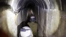 Israeli soldiers stand guard inside a tunnel exposed by the Israeli military near Kibbutz Ein Hashlosha, just outside the southern Gaza Strip October 13, 2013. Israel displayed on Sunday what it called a Palestinian "terror tunnel" running into its territory from the Gaza Strip and said it was subsequently freezing the transfer of building material to the enclave. REUTERS/Amir Cohen (ISRAEL - Tags: POLITICS CIVIL UNREST MILITARY TPX IMAGES OF THE DAY)