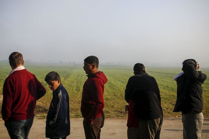 Běženci v táboře Idomeni na řecko-makedonské hranici.