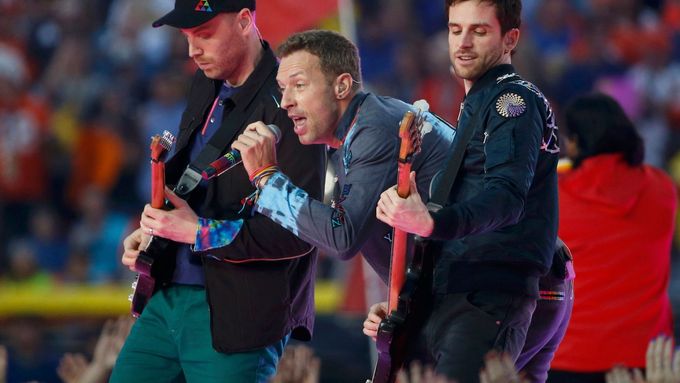 Chris Martin, lead singer of Coldplay, performs with the band during the half-time show at the NFL's Super Bowl 50 between the Carolina Panthers and the Denver Broncos in