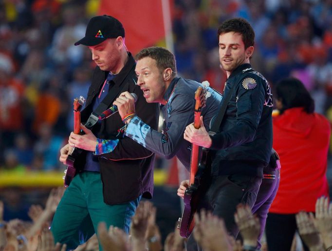 Chris Martin, lead singer of Coldplay, performs with the band during the half-time show at the NFL's Super Bowl 50 between the Carolina Panthers and the Denver Broncos in