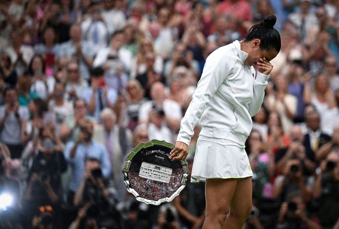 Tennis - Wimbledon - All England Lawn Tennis and Croquet Club, London, Britain - July 15, 2023 Tunisia’s Ons Jabeur with the runners up trophy after losing her final matc