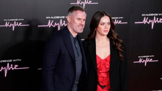 Jamie Carragher s dcerou Miou na snímku z roku 2023