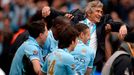 Manchester City's manager Pellegrini is carried by players as they celebrate winning the league after their English Premier League soccer match against West Ham United at