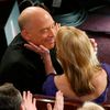 Best supporting actor winner Simmons  is congratulated by his wife Michelle Schumache at the 87th Academy Awards in Hollywood