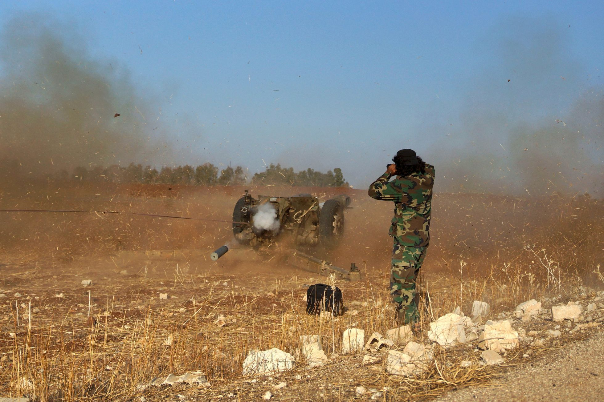 Syrská svobodná armáda bojující s vládními jednotkami prezidenta Asada.