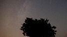 A meteor streaks across the sky during the Perseid meteor shower near Kraljevine on mountain Smetovi in the early morning