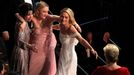 Actresses (L-R) Sally Hawkins, Saoirse Ronan and Margot Robbie reach out to Meryl Streep (R) as they all react after Frances McDormand's Best Actress acceptance speech.