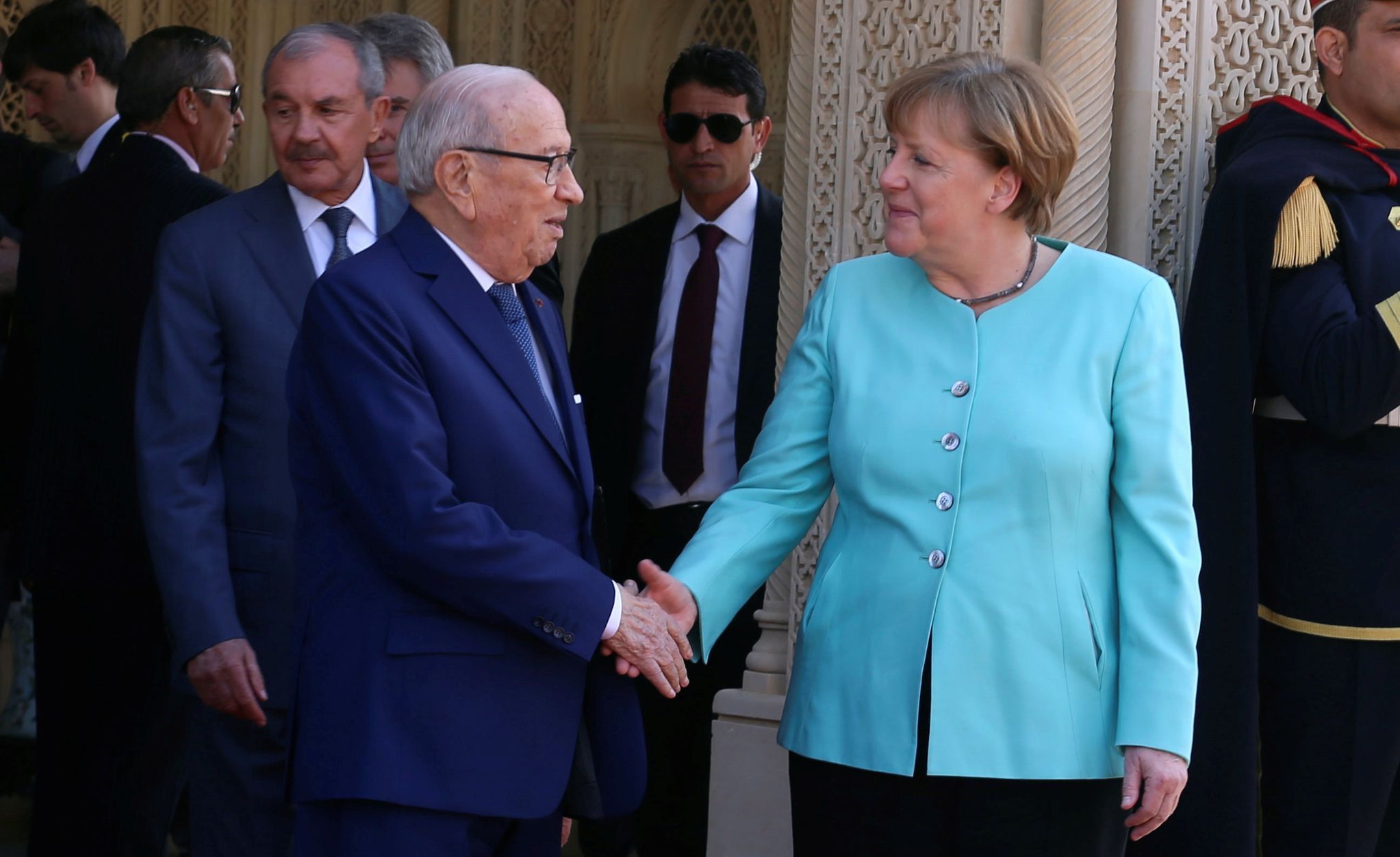 Německá kancléřka Angela Merkelová a tuniský prezident Kaíd Sibsí.