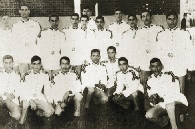 Venezuela's President Hugo Chavez (standing, 2nd L) is pictured during his Military Academy years, in this undated handout photo provided by Venezuela's Ministry of Information and Communication. REUTERS/Ministry of Information and Communication/Handout (VENEZUELA - Tags: POLITICS PROFILE HEALTH MILITARY) ATTENTION EDITORS - THIS IMAGE WAS PROVIDED BY A THIRD PARTY. FOR EDITORIAL USE ONLY. NOT FOR SALE FOR MARKETING OR ADVERTISING CAMPAIGNS. THIS PICTURE IS DISTRIBUTED EXACTLY AS RECEIVED BY REUTERS, AS A SERVICE TO CLIENTS Published: Úno. 15, 2013, 11:40 odp.