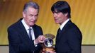 Germany coach Joachim Loew (R) is presented the FIFA Men's World Coach of the Year trophy by former Bayern Munich coach Ottmar Hitzfeld, during the FIFA Ballon d'Or 2014