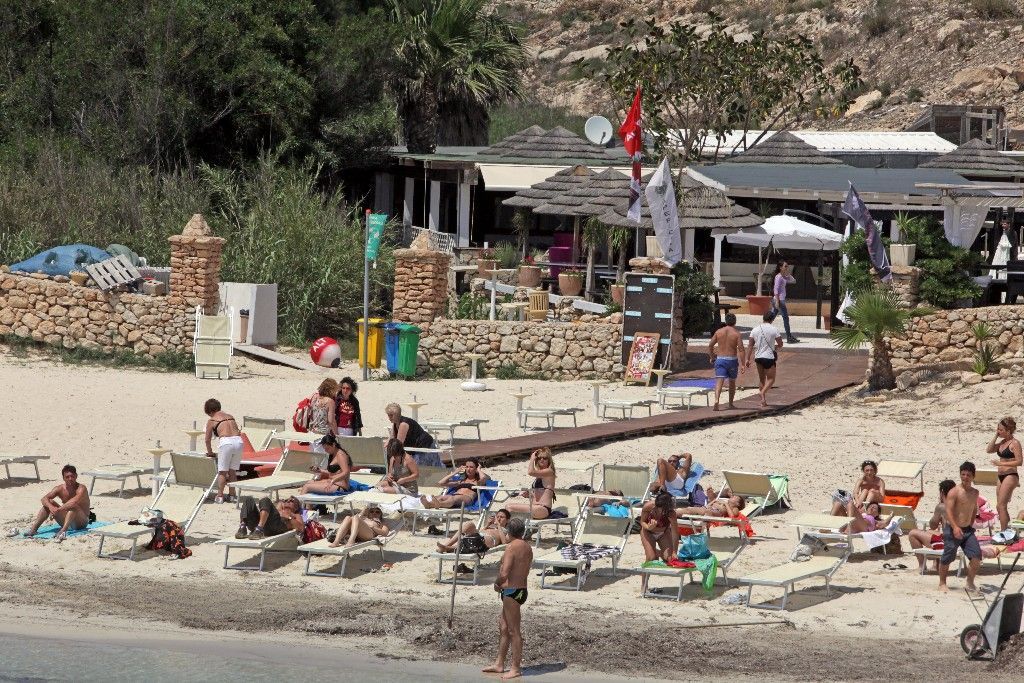 Turisté versus migranti na Lampeduse