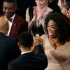 Winfrey and Oyelowo congratulate Legend and Common after &quot;Glory&quot; won the Oscar for best original song during the 87th Academy Awards in Hollywood