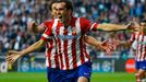 Atletico Madrid's Diego Godin celebrates after scoring a goal against Real Madrid during their Champions League final soccer match at Luz stadium in Lisbon, May 24, 2014.