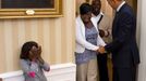 Aug. 8, 2012 "Overcome with emotion, eight-year old Make-A-Wish child Janiya Penny reacts just after meeting the President as he welcomes her family to the Oval Office."