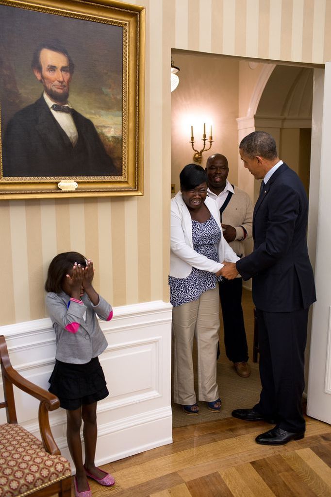 Aug. 8, 2012 "Overcome with emotion, eight-year old Make-A-Wish child Janiya Penny reacts just after meeting the President as he welcomes her family to the Oval Office."