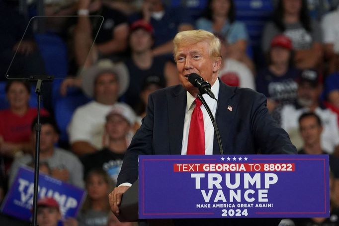 Republican presidential nominee and former U.S. President Donald Trump speaks during a campaign rally held along his running mate Senator JD Vance, in Atlanta, Georgia, U