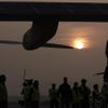 A crew member prepares the Solar Impulse aircraft before take off at Payerne airport May 24, 2012. The Solar Impulse HB-SIA prototype aircraft, which has 12,000 solar cells built into its 64.3 metres (193 feet) wings, attempted its first intercontinental flight from Payerne to Rabat in Morocco with a few days for a technical stop and a change of pilot in Madrid. This flight will act as a final rehearsal for the 2014 round-the-world flight. REUTERS/Denis Balibouse (SWITZERLAND - Tags: TRANSPORT SCIENCE TECHNOLOGY SOCIETY) Published: Kvě. 24, 2012, 7:43 dop.
