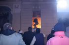 The angry demonstrators got inside the US embassy compound setting several rooms on fire. Charred body of one of them was later found at the scene.