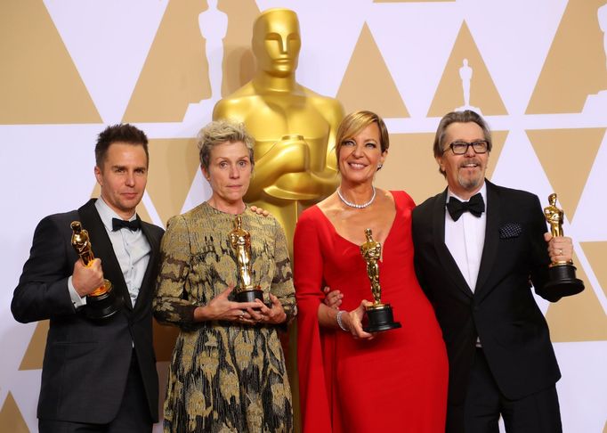 Oscar winners Sam Rockwell, Frances McDormand, Allison Janney and Gary Oldman (L to R) pose backstage.