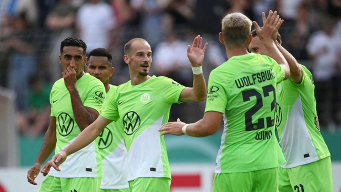 Soccer Football - DFB Cup - First Round - TuS Makkabi Berlin v VfL Wolfsburg - Mommsenstadion, Berlin, Germany - August 13, 2023 VfL Wolfsburg's Yannick Gerhardt celebrat