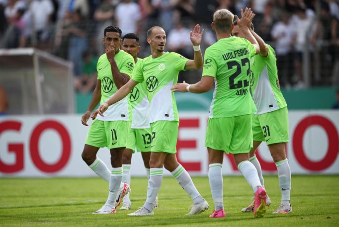 Soccer Football - DFB Cup - First Round - TuS Makkabi Berlin v VfL Wolfsburg - Mommsenstadion, Berlin, Germany - August 13, 2023 VfL Wolfsburg's Yannick Gerhardt celebrat