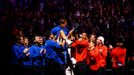 Tennis - Laver Cup - 02 Arena, London, Britain - September 24, 2022  Team Europe and World members lift Roger Federer at the end of his last match after announcing his re