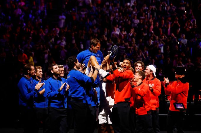 Tennis - Laver Cup - 02 Arena, London, Britain - September 24, 2022  Team Europe and World members lift Roger Federer at the end of his last match after announcing his re