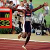 FILE PHOTO: U.S.' Johnson celebrates after breaking world record in 200M finals at Atlanta Olympics