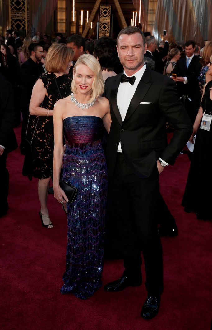 Australian actress Naomi Watts wearing an Armani Prive gown, Bulgari jewels and Stuart Weitzman shoes, and her partner Liev Schreiber arrive