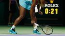 Serena Williams of the U.S. smashes her second racquet during her WTA Finals singles semi-finals tennis match against Caroline Wozniacki of Denmark, at the Singapore Indo